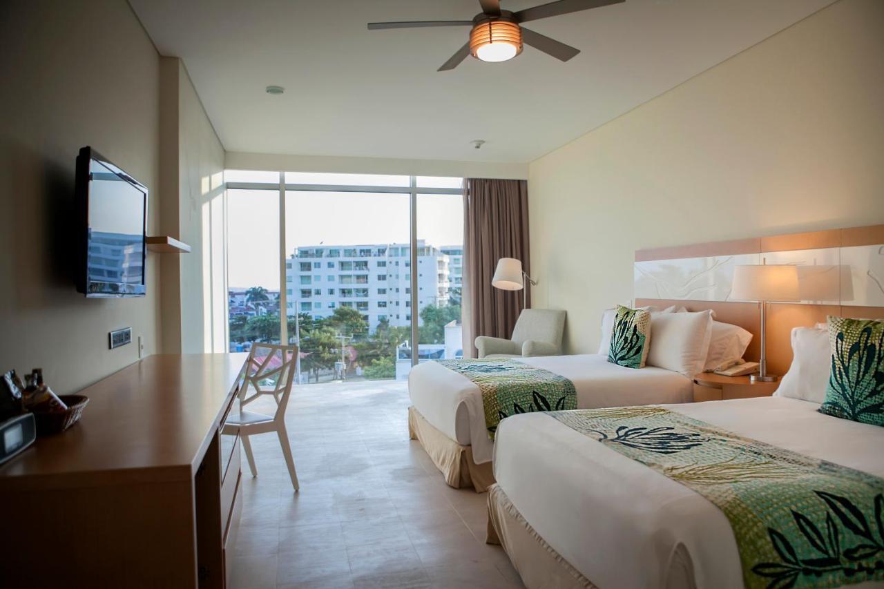 Las Americas Torre Del Mar Cartagena Exterior photo A room at the Iberostar Grand Hotel Bávaro